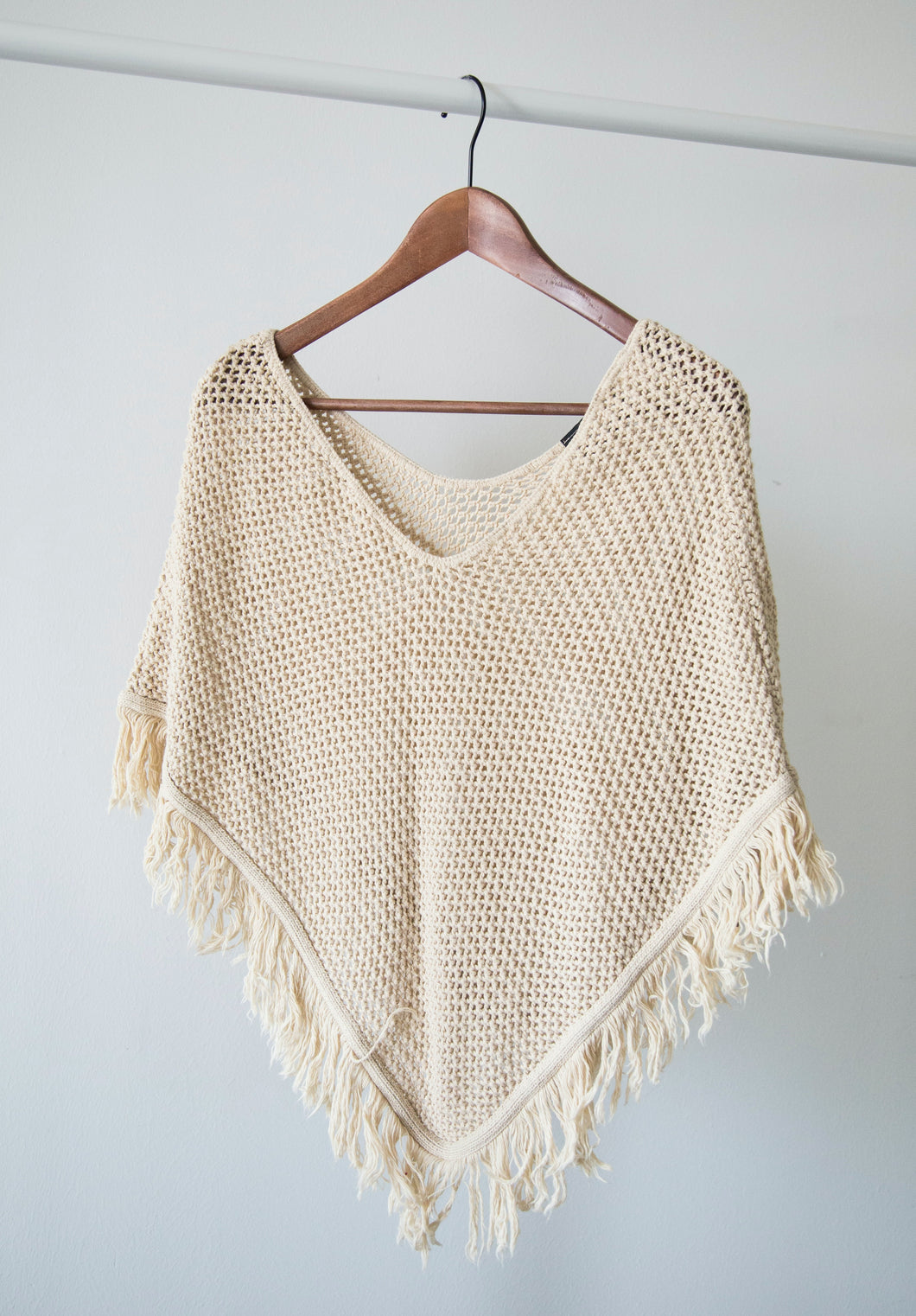 Knitted poncho using alpaca wool